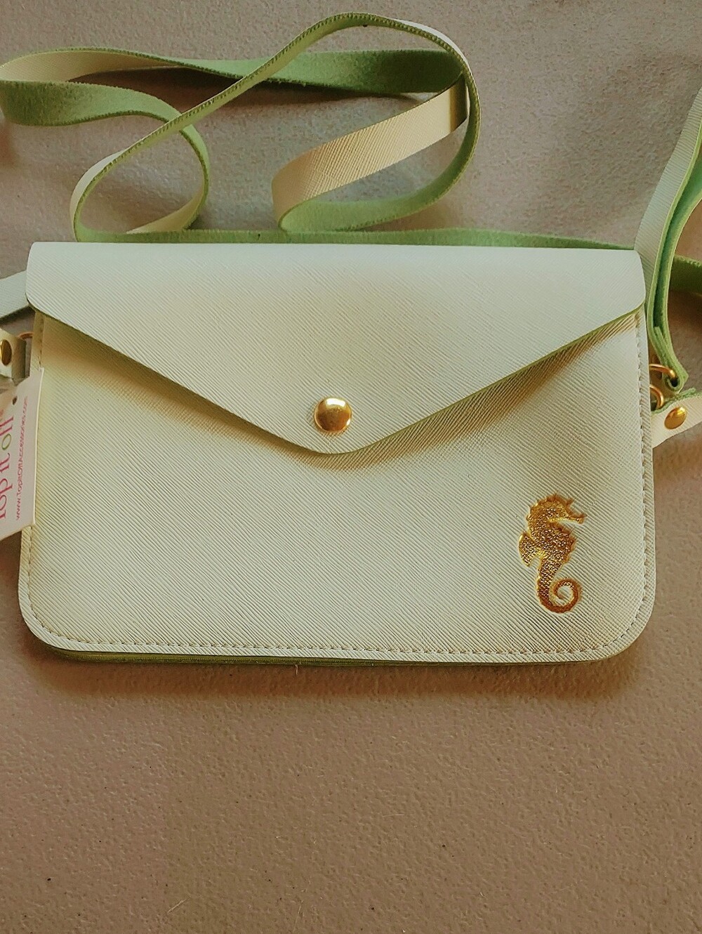 TOP IT OFF SMALL ENVELOPE PURSE  WRIST AND 21" SHOULDER STRAP 7 1/12 BY 5 1/2 IN